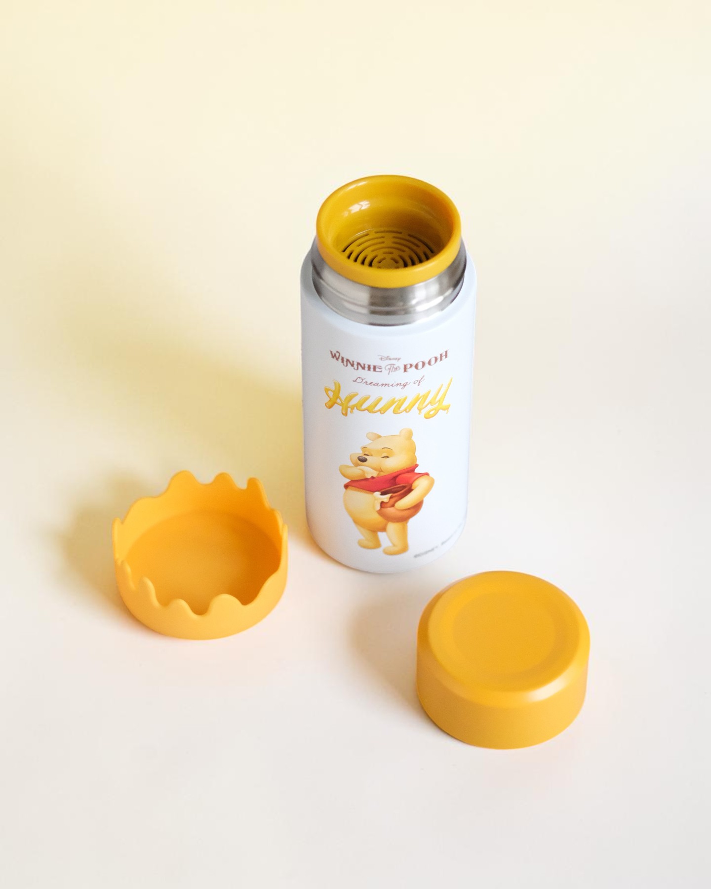 Bình nước Pooh thiếc nắp mật chảy